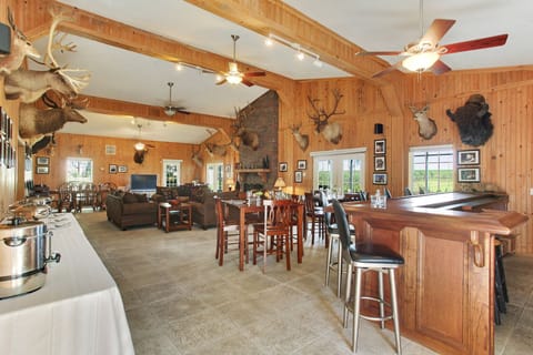 Great Room with Living, Dining, and Custom Built-In Teak Bar