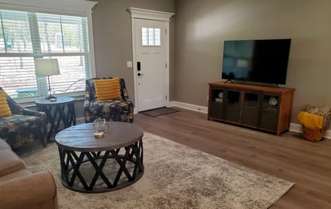 Spacious living room with 58 inch smart TV. Netflix and Hulu provided. 