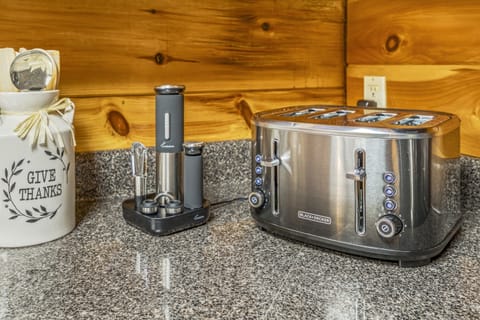 Indulge in culinary delight with every convenience at your fingertips! From the perfect toast to uncorking your favorite bottle, your kitchen oasis awaits.