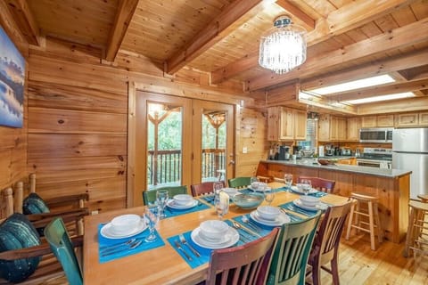 Enjoy a spacious, open dining and kitchen area, perfect for gatherings and meal preparation.