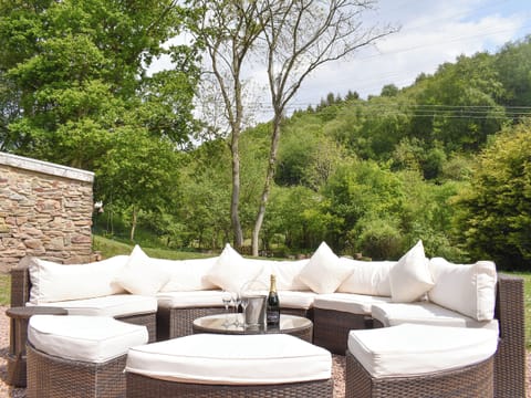 Luxurious outdoor seating area | Perivale Lodge, near Lydney