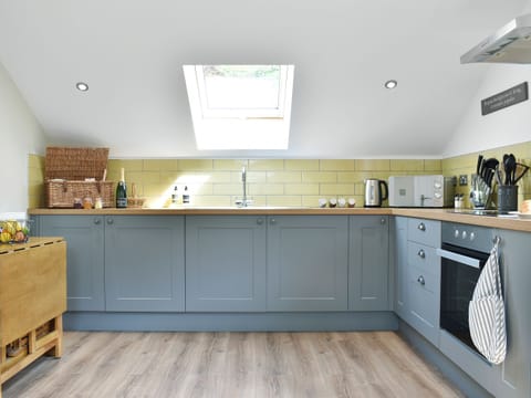 Thoughtfully converted kitchen/dining room | Perivale Lodge, near Lydney