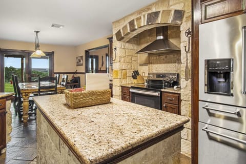 The dining table seats six, and it's conveniently located right next to the roomy kitchen.