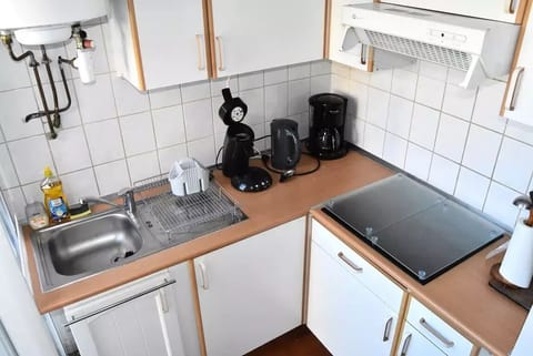 Fridge, microwave, cookware/dishes/utensils