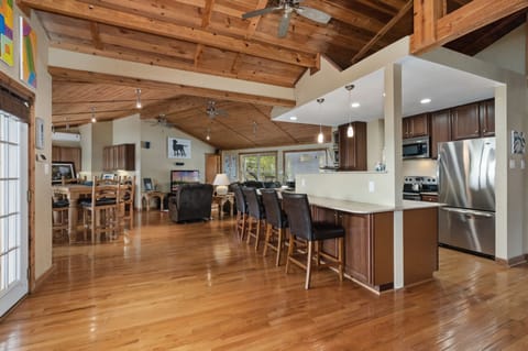 Main level. Seats 8 people at kitchen counter - a very popular social space.