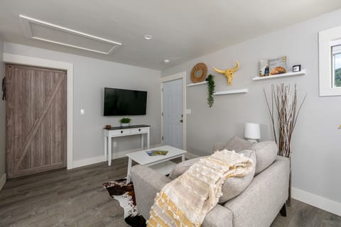 Comfy loveseat with 50" smart 4K TV