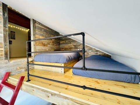 Upper loft has two full size beds 