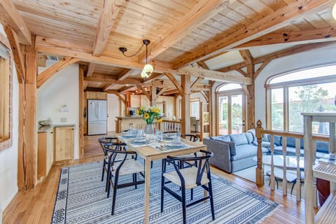 Dining Area with Hardwood Floors and Ceiling