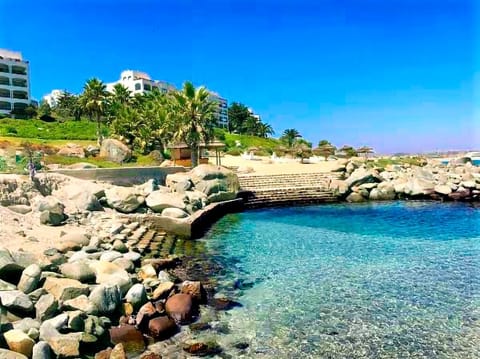 On the beach, sun loungers