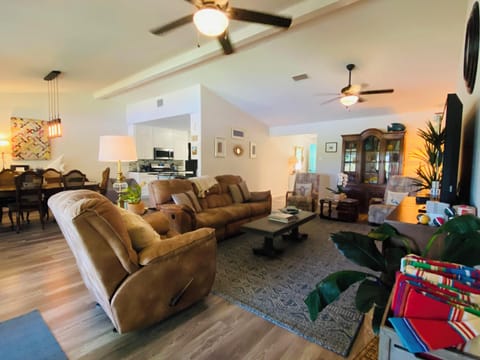 View of the living/dining/kitchen from the door of main bedroom.