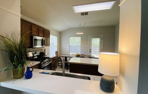 Look out from the kitchen and check on the kids while you finish up dinner