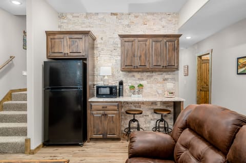 Lower level fridge and microwave along with Keurig for popcorn and hot chocolate!
