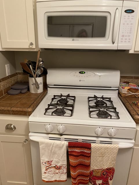 Gas oven, range, and microwave if you want to cook a meal.
