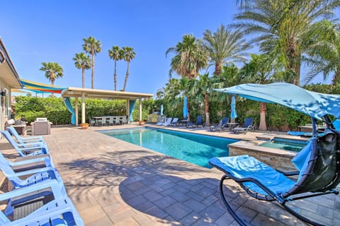 A heated pool, sun loungers