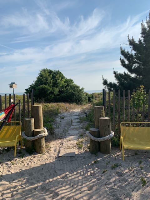 On the beach, sun loungers, beach towels