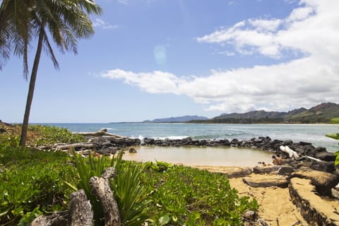 On the beach, sun loungers, beach towels