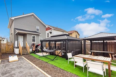 Bocce ball, gazebos, comfortable chairs, tables, turf, cornhole and dragons.