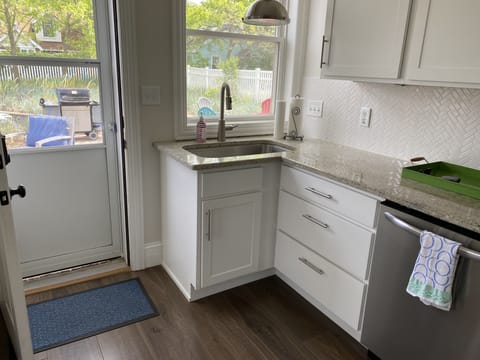 Kitchen leads directly out to the large outdoor area.