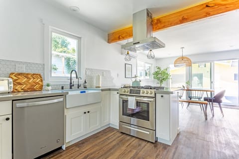 Cook delicious gourmet meals in our brand new kitchen with farmhouse sink