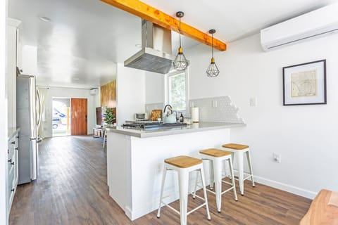 Dine at our eat-in bar right in front of the chef