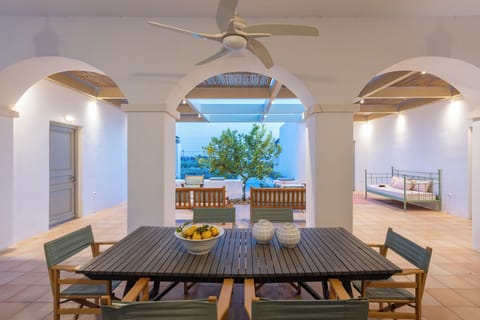 Protected dining on the comfortable verandah in the central courtyard