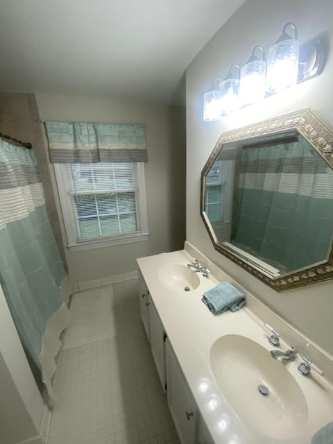 Combined shower/tub, hair dryer, towels, soap