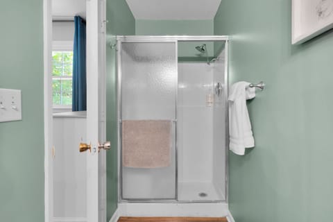 Combined shower/tub, hair dryer, towels, soap