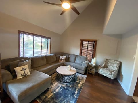 Vaulted ceilings in the main living space with ample seating and a bar!