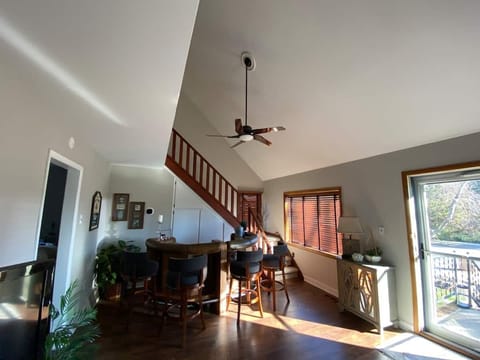 Vaulted ceilings in the main living space with ample seating and a bar!