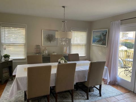 Enjoy a meals around this spacious dining room table.