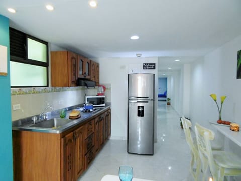 Fridge, microwave, coffee/tea maker, electric kettle