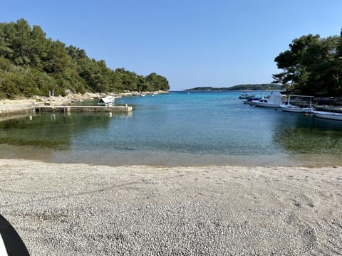 On the beach, sun loungers