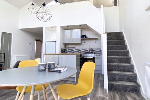 Spacious, double height dining, living and kitchen room.