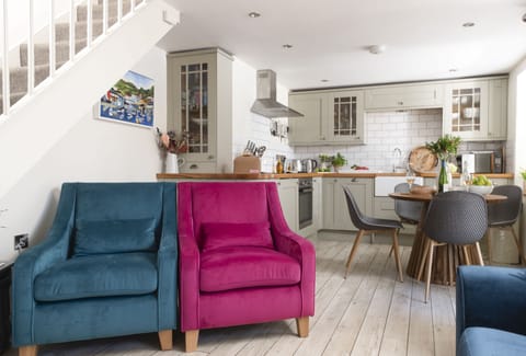 Oriel Cottage, St Agnes. Ground floor: The plush chairs add character to the space