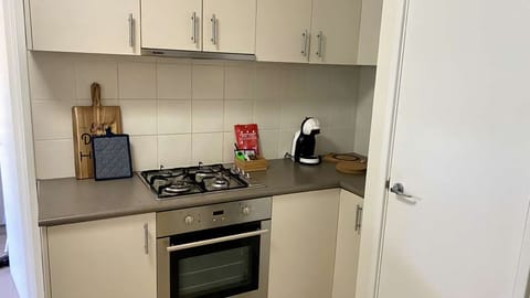 Microwave, dishwasher, dining tables