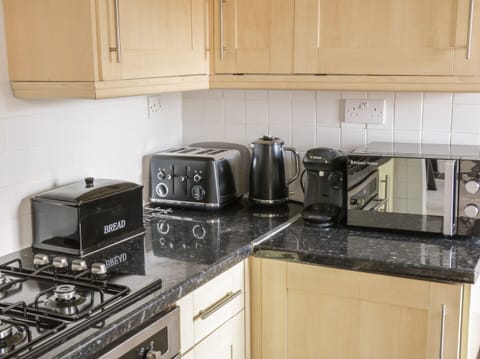 Fridge, microwave, oven, cookware/dishes/utensils