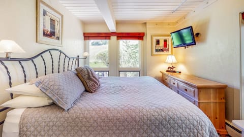 Master bedroom featuring a king bed and attached full bath