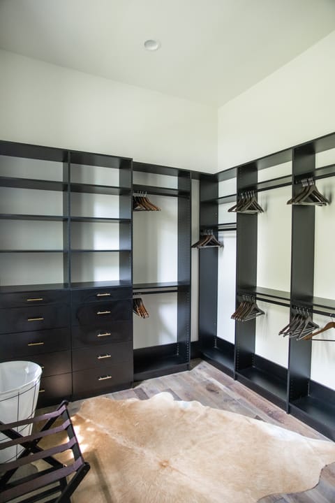 The main bedroom’s enormous walk-in closet is the envy of every guest.
