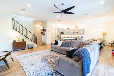 Large living room with oversized sectional couch