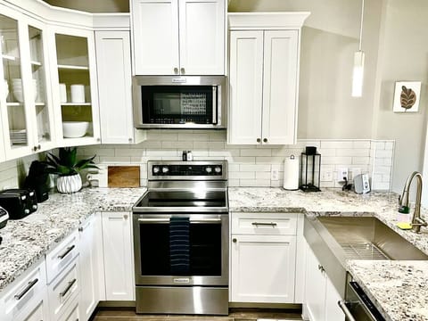 Unit 102 River Palmetto's Fully stocked kitchen...ready for those cocktails, mocktails and grub!