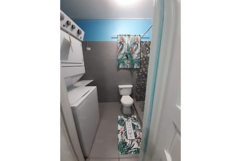 Bathroom with washer and dryer combo