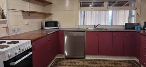 Kitchen with basic equipment - including dishwasher
