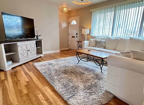 Sun drenched, first floor living room with plenty of seating