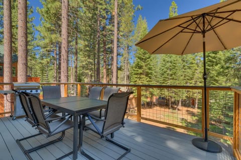 - Forest view deck with outdoor dining
- BBQ grill and umbrella shade setup
- Relax in fresh mountain air retreat
