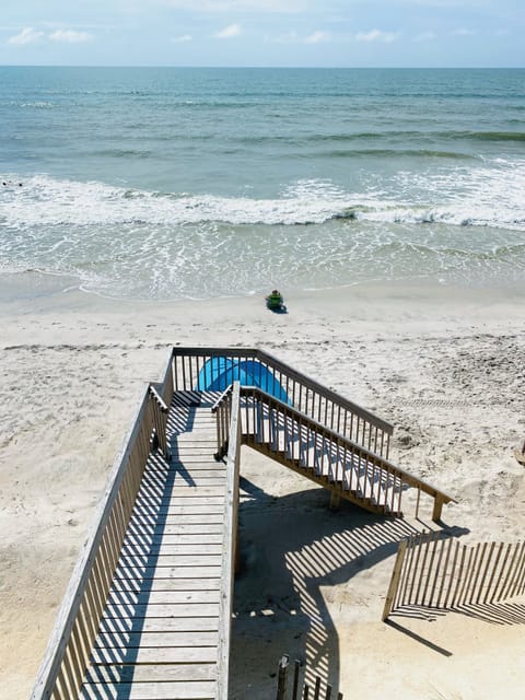 On the beach, sun loungers