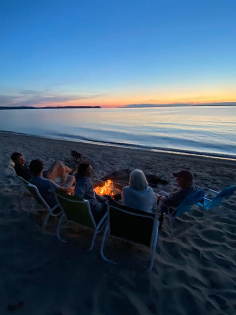 On the beach, sun loungers, beach towels