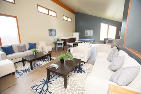 Community event room at clubhouse with foosball and ping pong table!