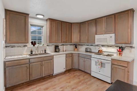 Prepare your favorite dishes in this spacious and well-appointed kitchen, offering everything you need for a comfortable stay