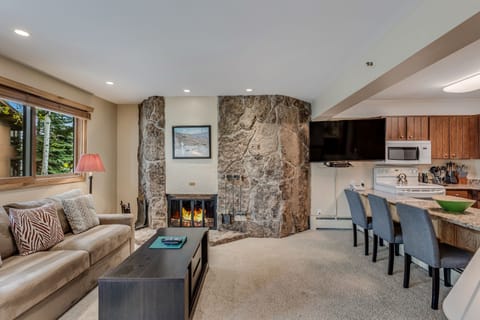 Living room with wood-burning fireplace