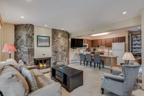 Living room with wood-burning fireplace